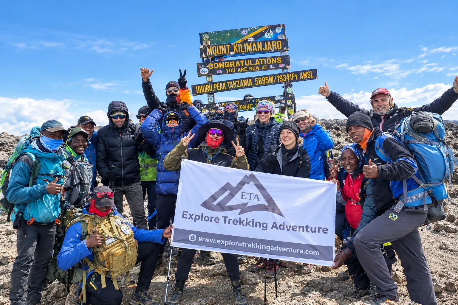 Guide and travellers on a Kilimanjaro trekking route